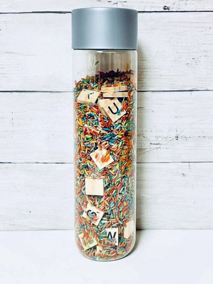 DIY Rainbow Rice I Spy Sensory Bottle