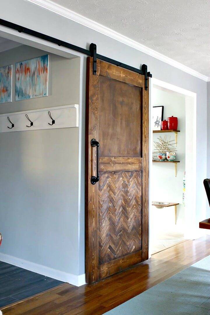 Lovely DIY Sliding Herringbone Barn Door