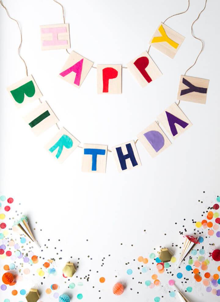 Pretty DIY Balsa Wood Happy Birthday Banner